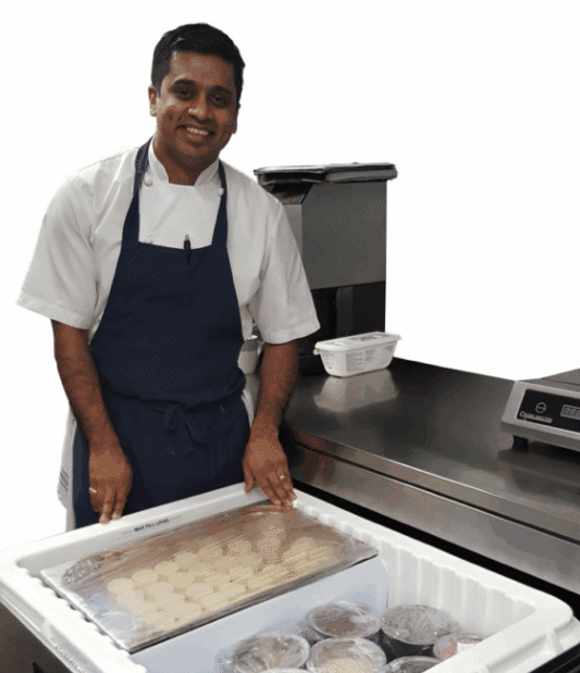 Chef at Gilpin using Adande drawers in kitchen